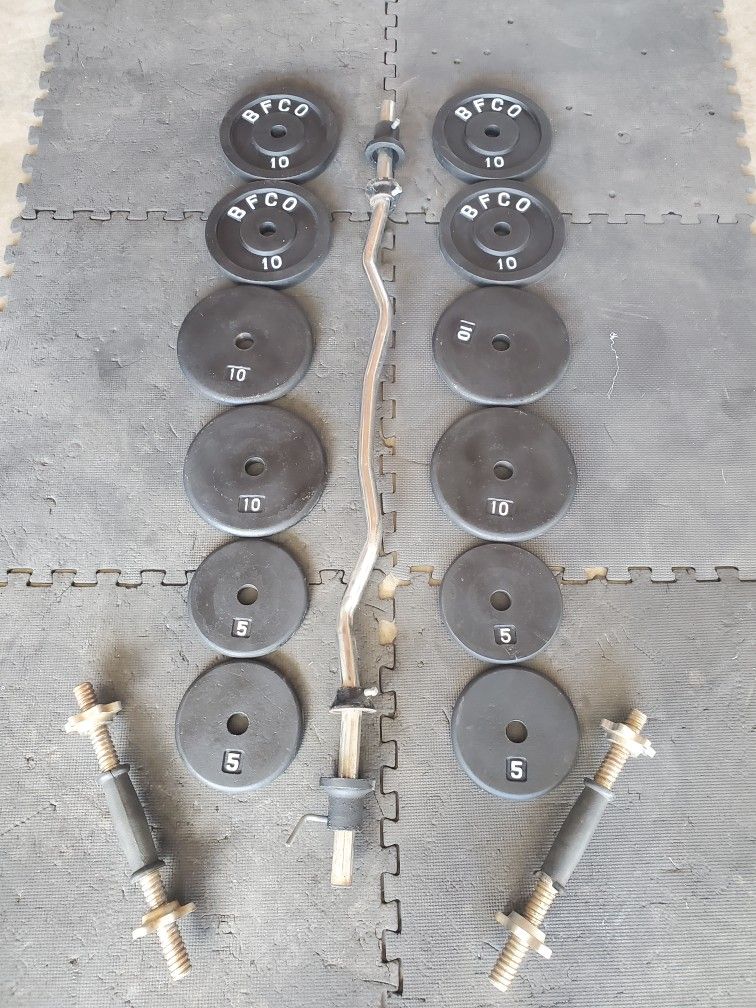 Standard Curl Weight Set With Adjustable Dumbells 8x10lbs 4x5lbs Thats 100lbs All Together..