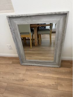 Gray mirror living room dining room kitchen