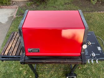 Vintage classic red Webber gas bbq barbecue grille