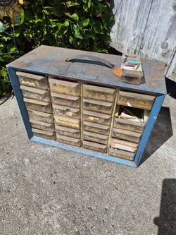 vintage Akro-Mils blue metal storage cabinet with clear plastic drawers