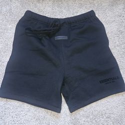 Essentials fear of God black shorts medium.