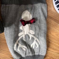 Dog sweater it says it’s a medium. I think it’s a large.