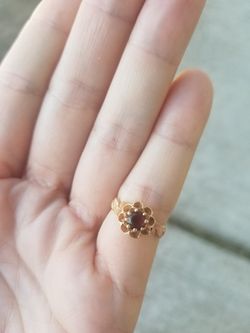 Gold and garnet flower ring