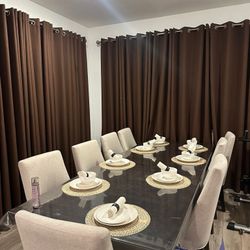 8-Seater Glass Dining Table Set $1,050 .