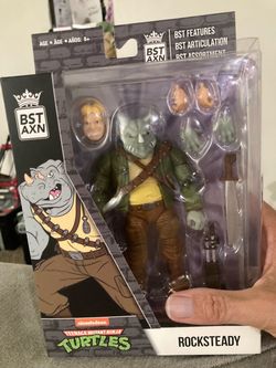 BST AXN TMNT Rocksteady Action Figure