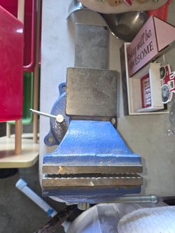 Blue cast iron mechanic's bench vise