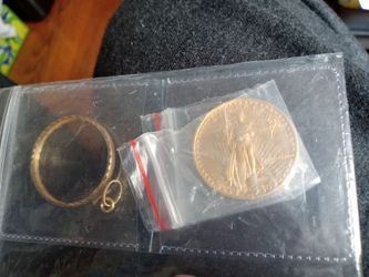 Gold coin and a necklace u can put the coin in