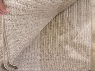 Beige Indoor/outdoor area rug 9x12