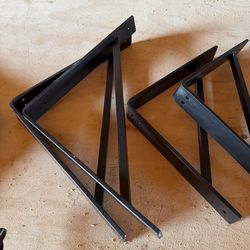 A pair of Heavy duty/industrial custom made metal brackets