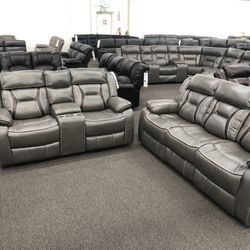 New Reclining Couch / Love Seat.  Grey Gel Leatherette.  Free Delivery!