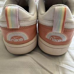 Pink Nike Shoes With Rainbow Logo