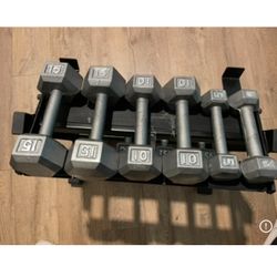 In NEW Condition Set Of Cast Iron Hex Dumbbells 5s, 10s, 15s 20s  And  25s  (NO RACK iNCLUDED)