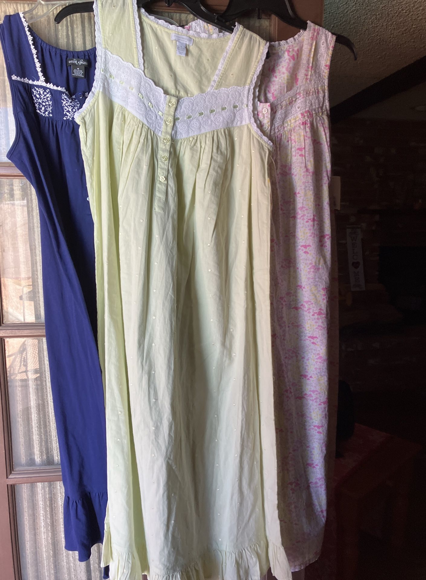 Three Brand New With Tags Ladies Nightgowns, One Navy And White, One Light Yellow And One Pink And White. Size Medium
