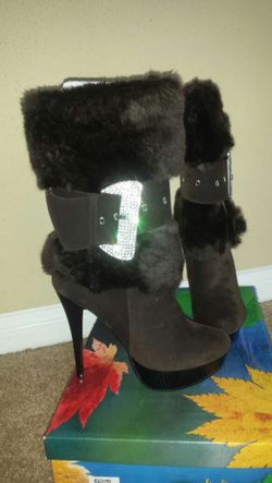 ITALIAN faux fur boots with Diamond buckle accent. $50