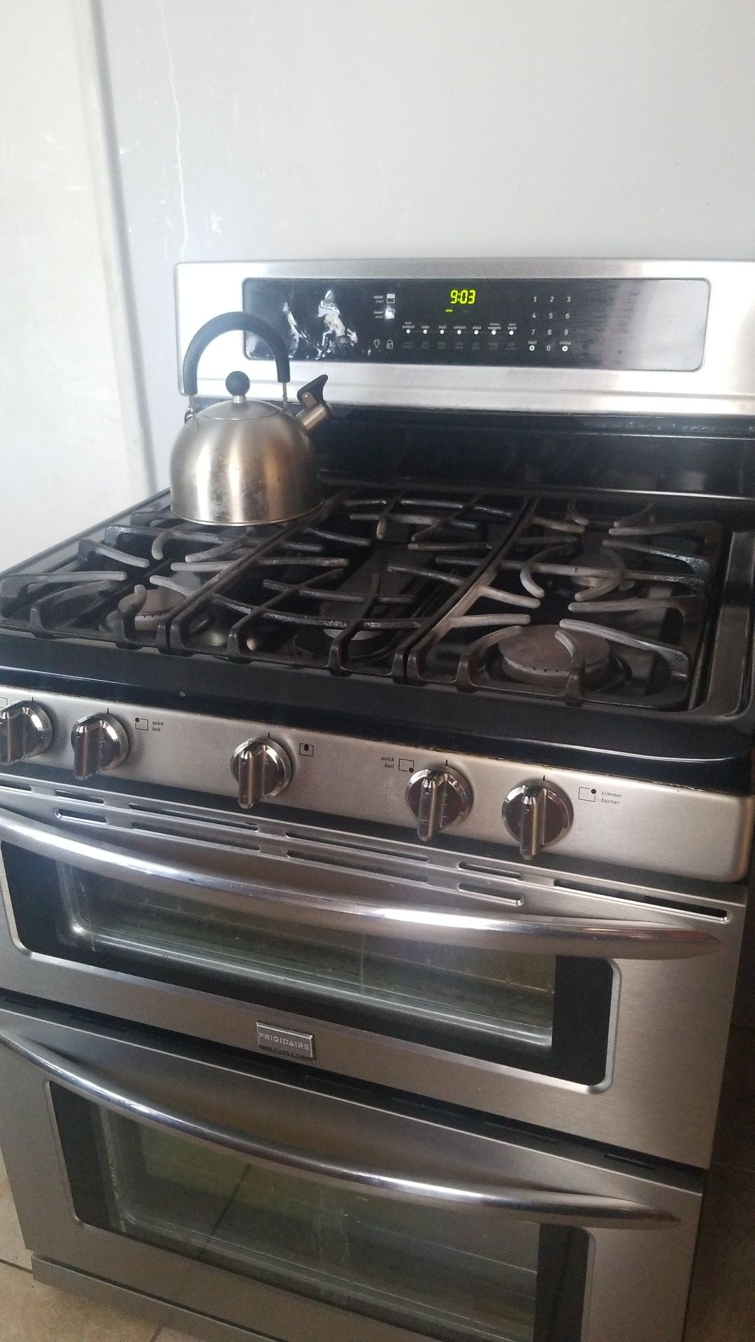 Frigidaire 5 burner stove ( double oven) plus selve cleaner.