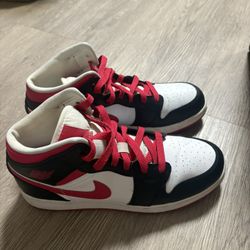 Red Black And White Jordan High Tops.