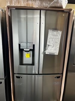 NEW IN BOX LG FRENCH STYLE REFRIGERATOR STAINLESS