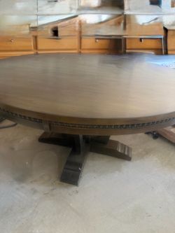 Round Wood Dining Table with Pedestal Base and 7 upholstered chairs