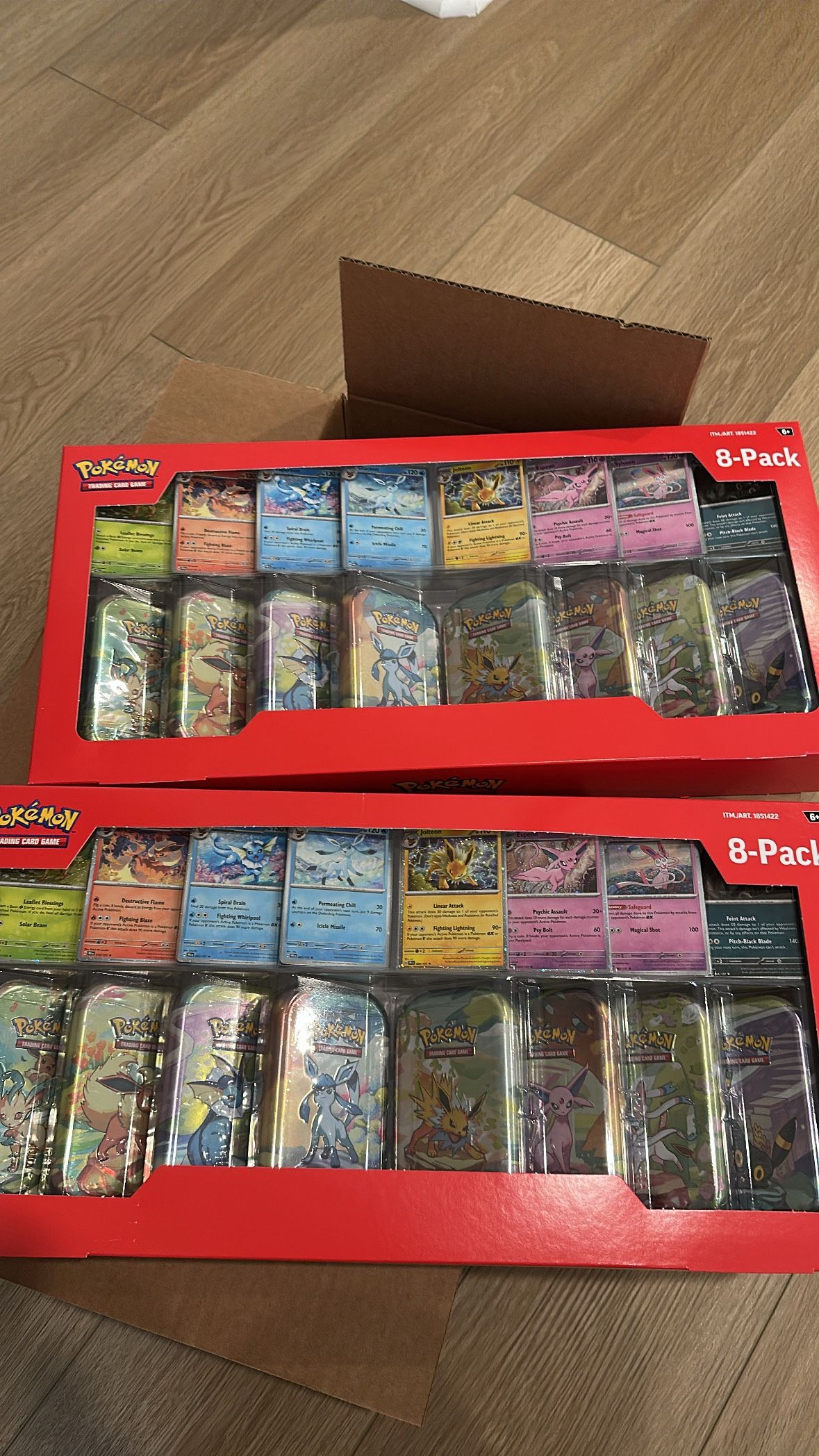 Pokemon Prismatic Evolutions Costco Tins