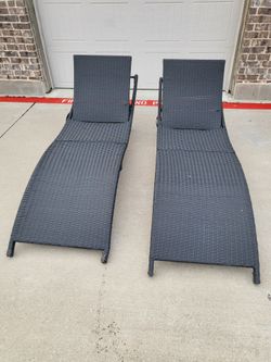 2  patio pool loungers wicker and metal