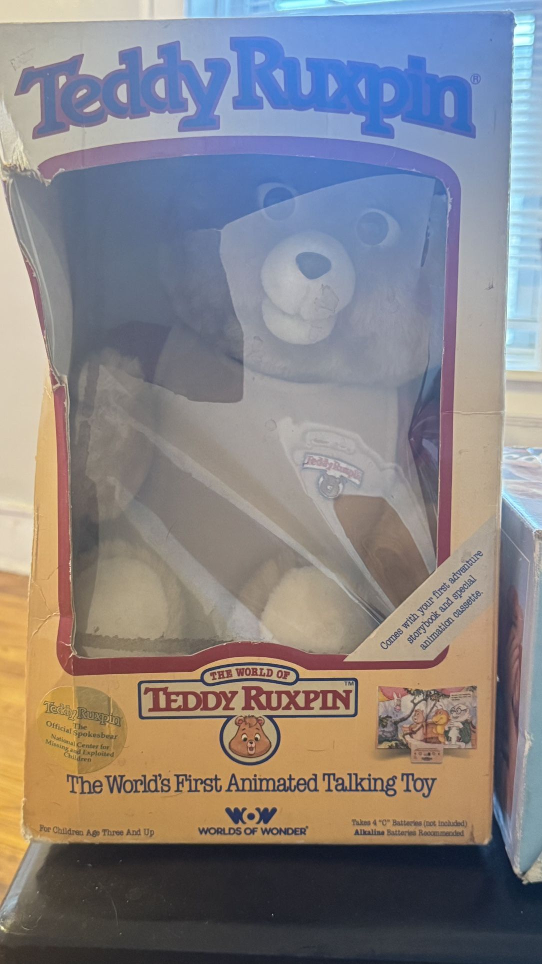 vintage Teddy Ruxpin, the world's first animatronic talking toy, in its original box.