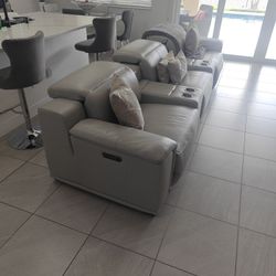 Gray Leather Reclining Sofa