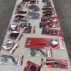 Tons of miscellaneous, plumbing, hardware, nails, window, stuff, and garage door hardware