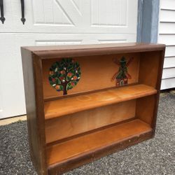 Book stand shelf with flowers living bedroom office