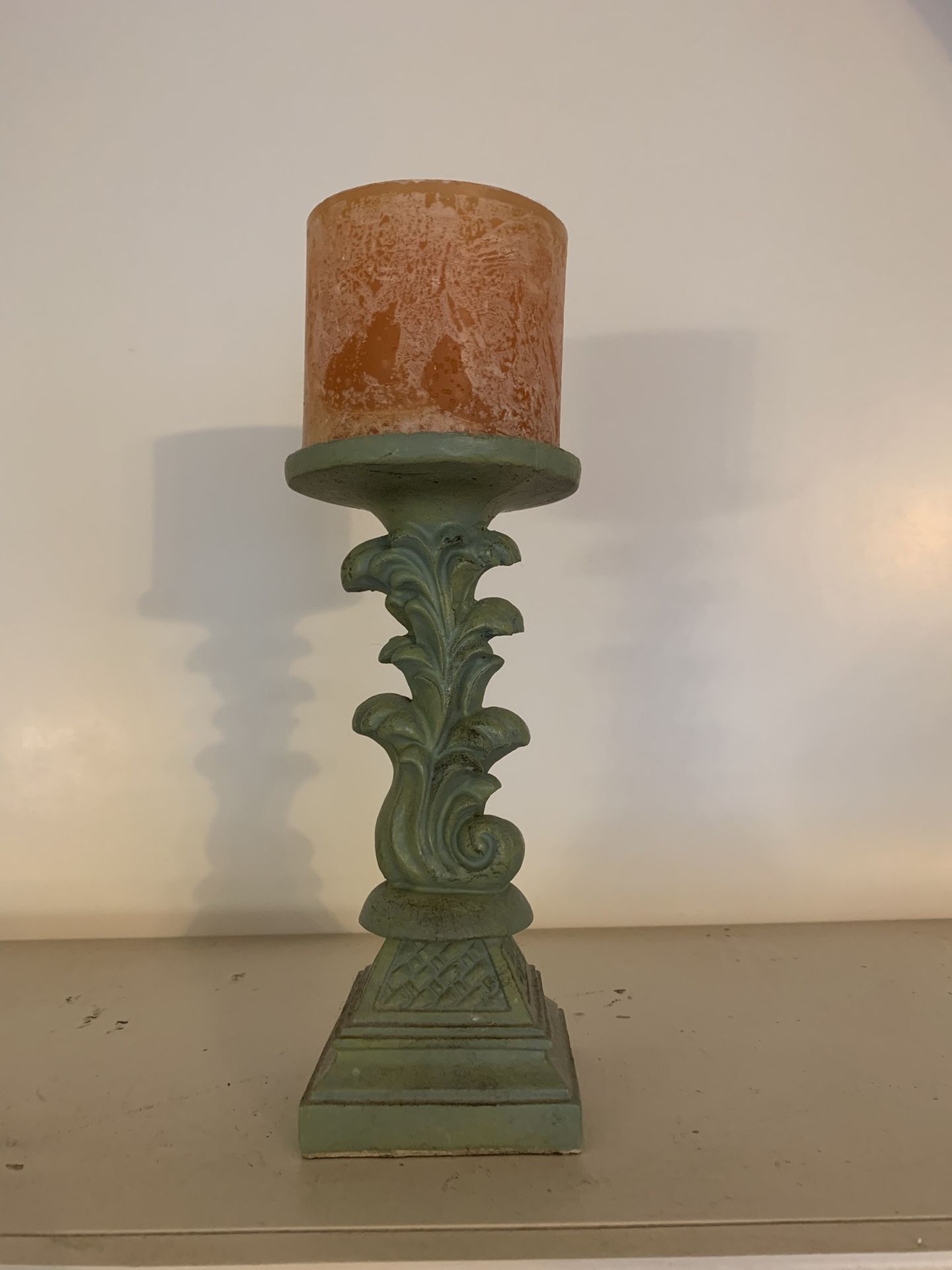 Vintage-Style Green Candle Holder with Ornate Scroll Design + Rustic Pillar Candle
