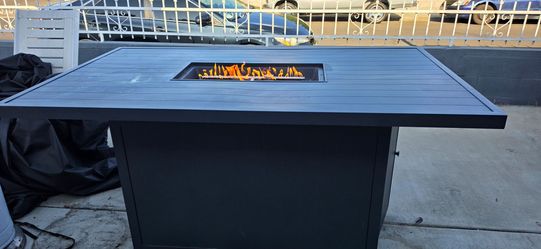 Outside Patio High Table with propane fire  pit in the middle with full propane bottle
