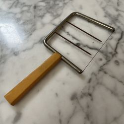 1930s 1940s Cheese Slicer with butterscotch bakelite handle, vintage Americana