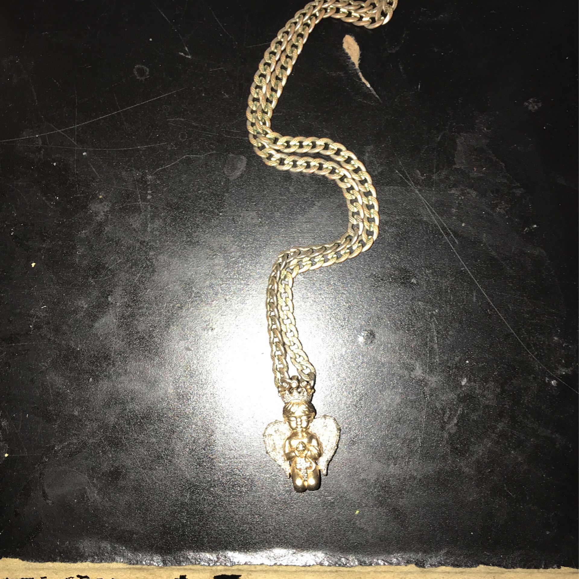 18k Chain And 10k Pendant
