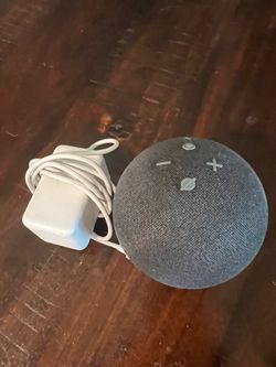 Amazon Alexa echo dot with power adapter and charger.