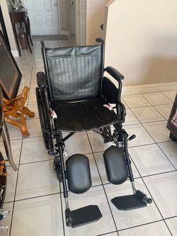 Black Manual Wheelchair with Elevating Leg Rests