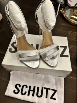 SCHUTZ Brand new box and dust bag included.