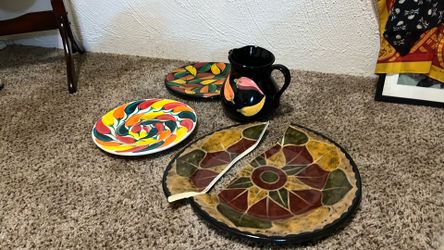 Set up ceramic plates and pitcher Set up ceramic plates and pitcher