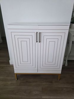 White Two-Door Shoe Cabinet with Gold Legs