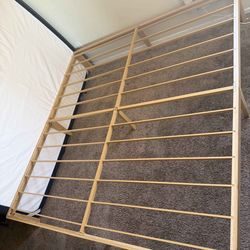 BRAND NEW COOLVIE 12” hybrid  king size mattress. With a gently  used  king size bed frame.