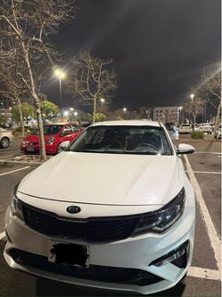 Kia Sedan – White