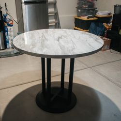 Round Marble-Look Dining Table with Black Pedestal Base