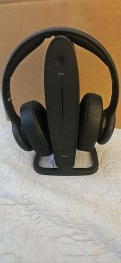 Insignia RF Wireless Over-the-Ear Headphones with their charging and transmitter dock