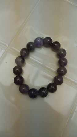 Amethyst bracelet one size fits all.