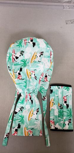 Surgical cap with ponytail pouch and matching face mask