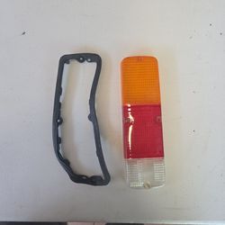 Original Toyota tail light lens cover with rubber