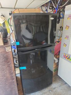 Whirlpool Gold Refrigerator moving sale. Top Down