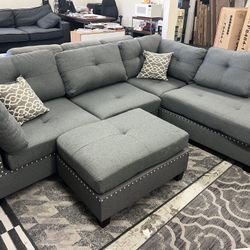 New Reversible Nailhead Sectional.  Grey.  104” X 75”.  Free Delivery!