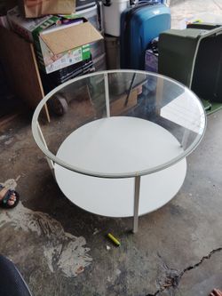 Glass table w/ storage on bottom