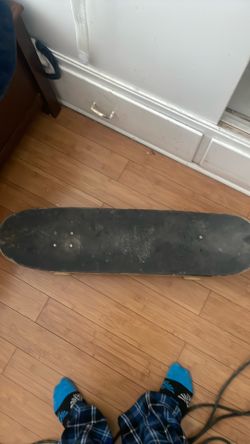 beaten up skateboard
