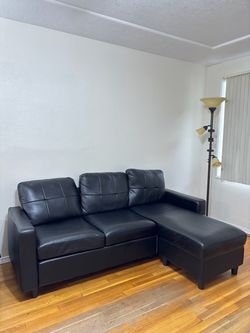 Black faux letter sectional
