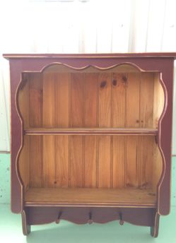 Dark red primitive shelf
